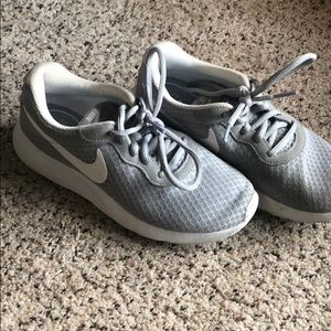 Women’s Nike grey tennis shoes